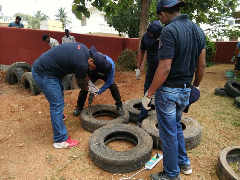 Toyota-employees-setting-up-eco-friendly-play-area-at-the-School