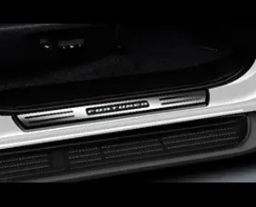 Illuminated scuffle plate