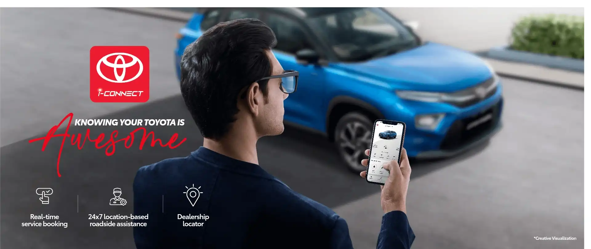 Chris standing up holding his daughter Elva