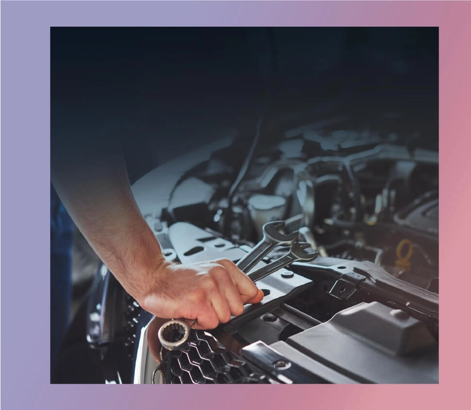 Chris standing up holding his daughter Elva